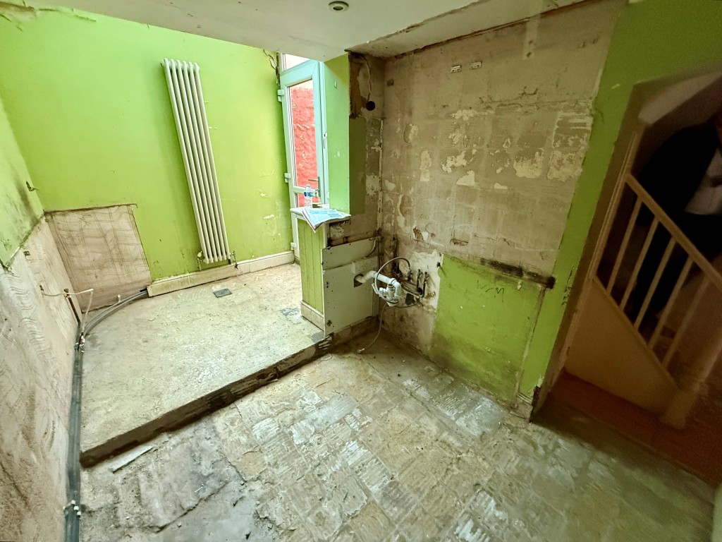Lot: 111 - THREE-BEDROOM DETACHED HOUSE FOR REFURBISHMENT - Former kitchen